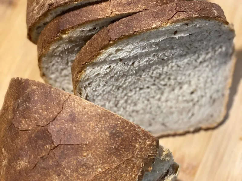 Sliced sourdough sandwich loaf
