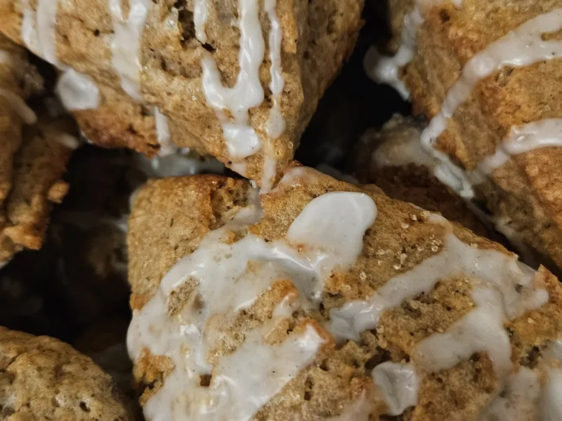 Fresh-baked scones with a sweet glaze drizzle